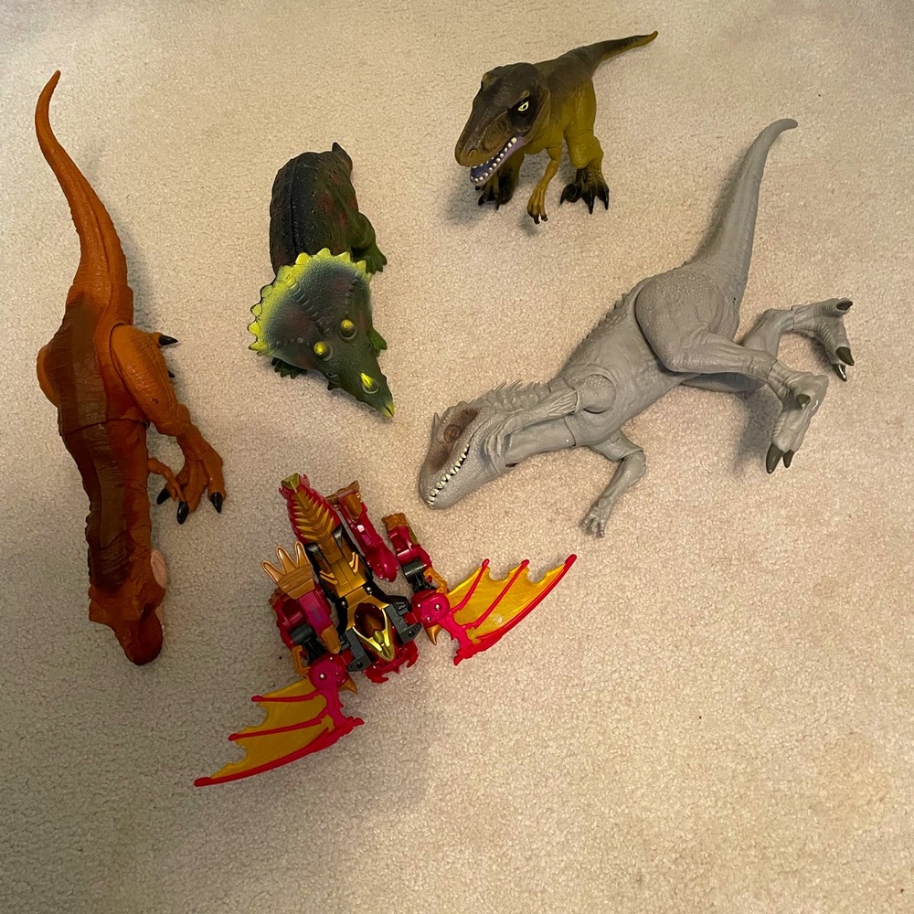 Set of 4 Dinosaurs and Transformer